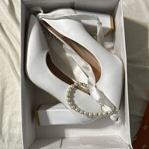 White heels with beaded ankle
